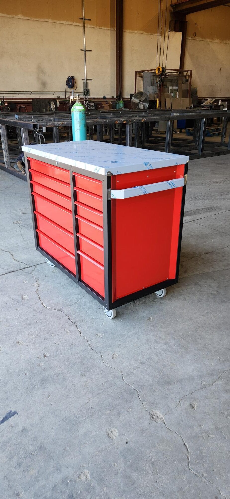 a red cabinet in a workshop